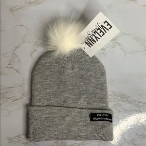 Grey furry pompom hat